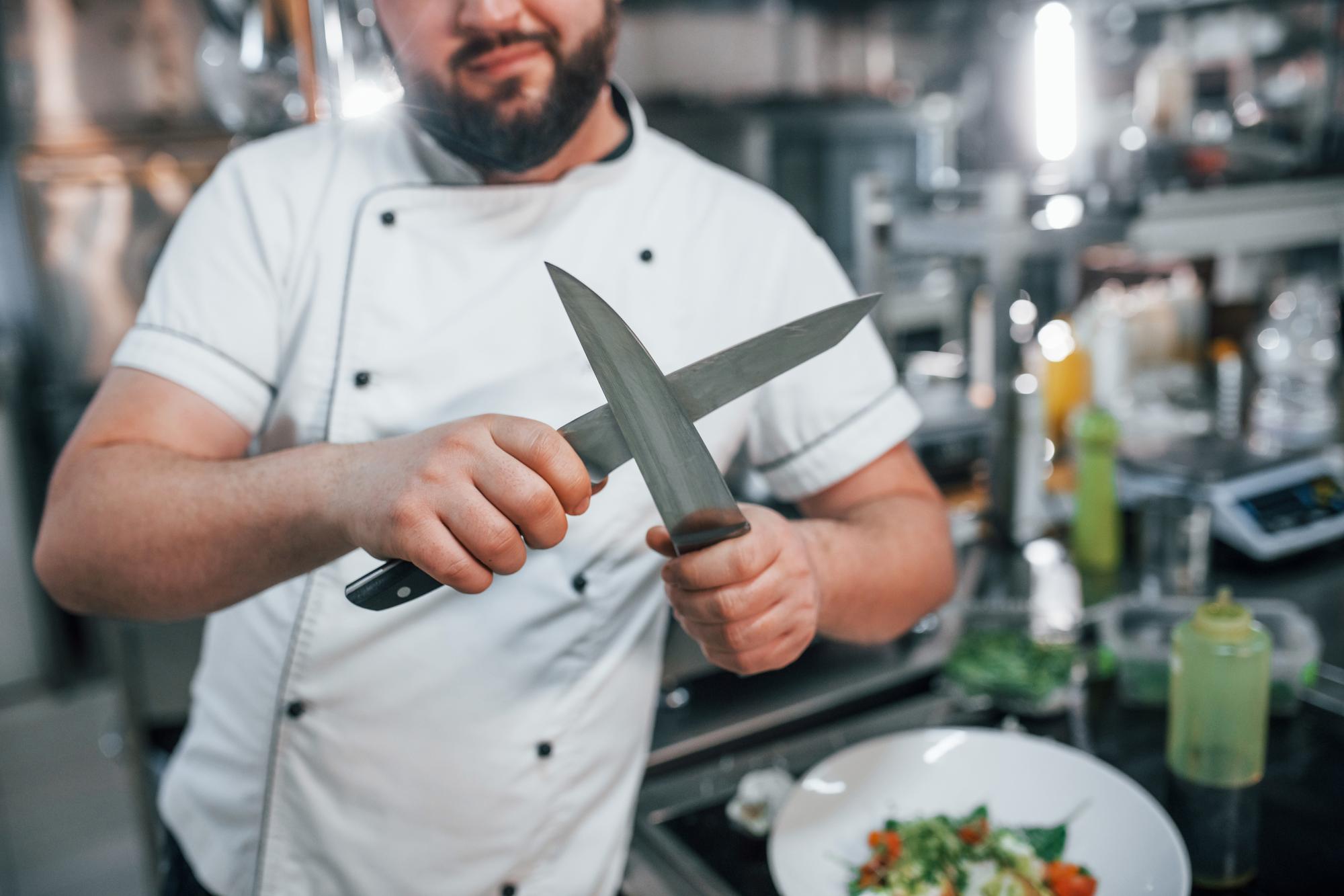 Chef demonstrating knife technique